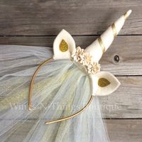 A personal favorite from my Etsy shop https://www.etsy.com/listing/265719856/gold-unicorn-crown-headband-w-tulle-veil