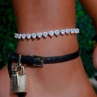 You know that something is special when it has a heart made of diamonds. This tennis anklet is no exception, with its delicate design and luxurious materials. It's the perfect way to show your love for someone special, or to celebrate a special occasion. The diamond heart will shimmer and sparkle in the light, making you feel like a true princess. Add this beautiful piece to your collection today, and enjoy it for years to come.