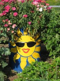 handmade garden decorations recycling metal barrels and tin cans