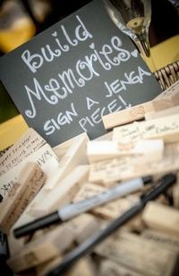 Guest Book Alternative: Jenga Pieces !!! PERFECT for mine and my loves future wedding, had it not been for jenga, we would never have met!!