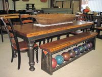What a cool table set! The table top is made from an old bowling lane and the bench was a bowling ball rack! (unknown source picture) #Rehouse, #repurpose, #retrobowling