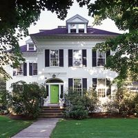 big white colonial bright color door