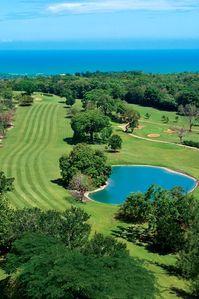 Complimentary green fees at Jamaica’s most elite and popular golf course at Sandals Golf & Country Club with a challenging 18 holes, par 71 course (Transfers to the golf course are included)! | Luxury Travel | Visit Jamaica | Sandals Ochi | Golf Course |