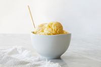 Tomato Sorbet Freeze a 16-ounce can whole or chopped San Marzano tomatoes. Process with the juice of 1 lime and salt and ground black pepper to taste. Garnish each serving with a sprig of fresh basil. Yield: 1 pint.