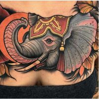 33. Sumptuous elephant tattoo on the chest. It is impossible not to admire, looking at this amazing tat! This ink located on the chest, and definitely won’t fit humble and quiet people! Perfectly traced lines and realistic design makes this ink eye-catching and memorable! - source