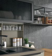 Matt Kenya grey | Honey aged oak | Aluminium frame with urban finish tempered bronze glass | Worktop: Fenix laminate | Bookcase: matt beaver | Plinth: urban oxidized