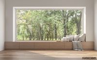 Stock Image: Side window seat 3d render.There are white room,wood seat,decorate with many pillow.There are big windows look out to see nature view.