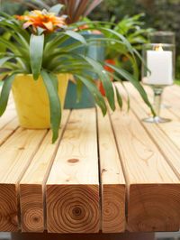 Outdoor Table Step 1: Cut cedar 2x4 boards and 4x4 posts to the desired length. Lay the boards on a level surface, placing 1/4-inch spacers between the boards, until you reach the desired width. Step 2: Cut several 2x4s approximately 1 inch shorter than the width of the tabletop. Place these 2x4 braces evenly along the length of the table (here, five were used). Use decking screws to hold the 2x4s in place on the bottom of the tabletop. Remove the spacers and set the top on a base