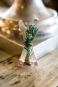 Apres Ski Buttonhole - Bloom Weddings Photography | Snowy Wedding in the Austrian Alps | Ian Stuart Wedding Dress | Valentino RockStud Shoes | Burgundy Bridesmaid Dresses & Flowers