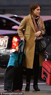 Bride-to-be: Prince Andrew's youngest daughter couldn't resist flashing her sparkling pink...