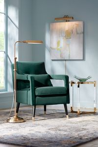 Pharmacy Floor Lamp ideal for home office, living room, or reading nooks, with energy-efficient LED built-in light and adjustable height with toggle switch and clear cord. | Featured: Culver Plated Aged Brass Adjustable Pharmacy LED Floor Lamp (Style 23r26); Light Gold 16" Wide Plug-In Picture Light (Style 82765); Tilman Hunter Green Modern Accent Chair (Style 82p85); Kaleen Chancellor CHA09-17 Blue Wool Area Rug (Style 69h63); Green Hand-Blown Glass 15" Wide Decorative Plate (Style 977e0).