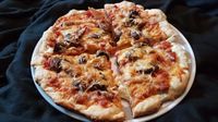 This no-yeast pizza crust recipe is quick and easy to make without the long hours of letting the dough rise and is perfect for a weeknight meal.