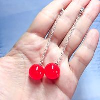 Excited to share this item from my #etsy shop: Red ball resin earrings. Resin earrings - chain earrings- red earrings- with gift box - long earrings - sphere earrings - resin sphere