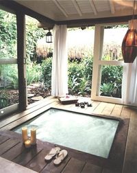 Covered backyard hot tub