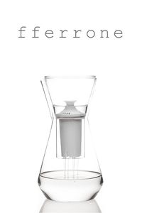 It is rare to have a functional object for everyday use as beautiful as the Talise, which accents the decor of a contemporary kitchen or dining room brilliantly. It can be used with the funnel to filter water or without the funnel for a drink of your choice. Handcrafted without the use of molds by master glassblowers. Takes Brita or Brita equivalent water filters, not included. Design: Felicia Ferrone, 2015 Handcrafted in Czech Republic