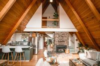 A six-month renovation transformed this A-frame cabin in Oregon's Hood River into a cozy family home—and a summer Airbnb rental.