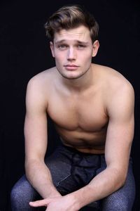 leaning forward sitting male model at DuckDuckGo