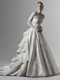 Wessex is a dramatic and unique Wedding Dress by #SotteroandMidgley #satinweddingdress #uniqueweddingdresses #longsleeveweddingdress