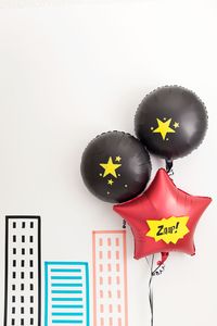 Learn how to make this fun, modern and non character themed DIY super hero themed party. -Tell Love and Party