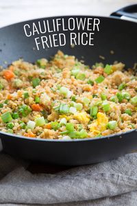 Tasty cauliflower fried rice is the low carb, Paleo recipe that satisfies your craving for takeout. Learn to make riced cauliflower the easy way with frozen, defrosted cauliflower.