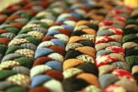 braided rug using sheets from the thrift store. Will go great with my bohemian decor #HomemadeRugs