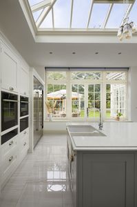 A modern day kitchen renovation project inside a glazed orangery.
