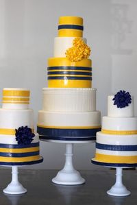 navy and yellow trio of cakes