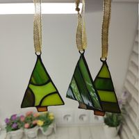 Stained glass small Christmas tree, set of 3 pcs, Glass mini, small holiday gift, stained Glass decor, window hangings, holiday centerpiece The price is specified for a set of 3 pieces Can be hung on a window or on a wall. This decoration will give you many years of enjoyment and is the perfect