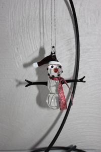 This snowman ornament is a beautiful addition to any collection. I used clear glass for the body of snowman, red and white for the hat and black for arms and face. The scarf is red material. All my pieces are made with borosilicate glass. I use a propane and oxygen torch to melt the glass to molten state and then shape the glass using gravity to manipulate it. This snowman is ready to ship, you will receive the one in the picture (see picture for measurement). All my pieces are done freehand wit