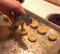 These dinosaur cookies would be a great "go-along" for a Berenstain Bears and the Dinosaur Dig party. Fill the "footprints" with chocolate :)