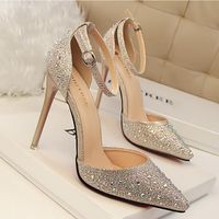 Pump Type: BasicHeel Height: Super High (8cm-up)Heel Type: Thin HeelsUpper Material: PUToe Shape: Pointed ToeOccasion: PartyClosure Type: Buckle StrapOutsole Material: RubberInsole Material: PUSeason: Spring/AutumnModel Number: 305-36Style: Fashionis_handmade: YesWith Platforms: NoLining Material: PUFit: Fits true to size, take your normal sizeFashion Element: CrystalGender: WomenItem Type: Pumps