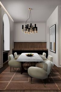 Neutral dining room area rugs are perfect for a cozy eating space that feels very welcoming. The Terracotta Rug is made of natural wool and botanical silk which adds warmth to this dining room. It is a great space to have family dinners.