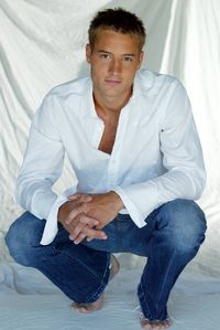Jonathan Carleton might possibly be a cross between Justin Hartley and Philip Winchester.