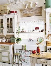 love the cabinets and old shelf above the window