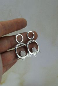Look at these wonderful handmade earrings made by me! Made from solid sterling silver (925) and natural pink quartz stone cabochon. This pair of minimalistic yet boho dangle drops are a perfect way to enhance your style. #handmade jewelry #etsyshop #madeingreece #sterlingsilverearrings #bohoearrings #bohogeometrical #shinysilverjewelry