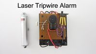 No security system is complete without lasers. Learn to build a laser tripwire alarm from a laser pointer, a couple of mirrors, and a few electrical parts.