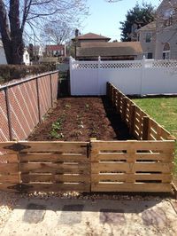 Nowadays, pallets really can be sued for everything. From furniture to artwork and even garden fences. This one is a low built fence to protect the modest vegetable patch, but it works. Even the gate was made from recycled pallets. And why not? The wood is perfectly reusable, and works great.