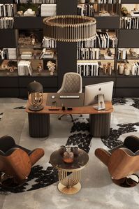 An amazing modern home office from the mid-century with the opulent Imperial Snake Rug. This roomy home office has a wonderful layout that encourages productivity while maintaining a warm atmosphere thanks to a plush rug.