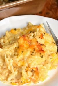 The BEST Hashbrown Casserole. Wonderful comforting potato dish loaded with cheddar cheese and creamy sauce. It's easily prepared without canned soup and baked to a gooey perfection. #sidedish #potatoes #sides #casserole #hashbrowns