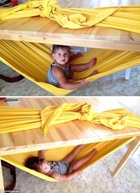 Mini hammock! This little cherub appeared quite enthralled by her own little hanging bed...