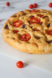 Side view of Garlic and Tomato Focaccia | cookingwithparita.com