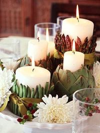 Candles Lined With Vegetables Tied Up With Ribbon