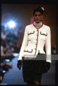 News Photo : A model walks the runway during the Chanel Haute...