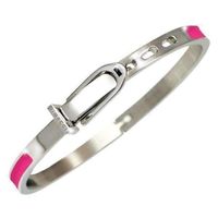 The Condé Bangle features an oval Stirrup clasp, made of Stainless Steel, Rose Gold or Gold with enamel inlays in Blue, Black, Orange, Pink, and Grey. We're big fans of the Rose Gold line - Pink, Black and Orange are our favs! 6 cm wide, adjustable in size