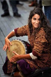Roma woman, rroma music. Ukraine, 2007. Did you know that the word "gypsy" is a racial slur against the Roma people?
