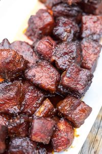 Pork Belly Burnt Ends are so easy to make and the most flavorful and tender smoked meat you could ever want! This is a pork version of burnt ends. Recipe Video how to and recipe! #burntends #porkbelly #pork #smoker #recipevideo #vindluge