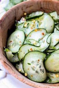Cilantro Lime Cucumber Salad from The Food Charlatan. This easy cucumber salad is a fast and fresh summer side dish with a bit of a kick. The cilantro adds the perfect twist! #cucumber #salad #cilantro #easy #lime #jalapeno #healthy #redpepper #easy #lowcarb #keto