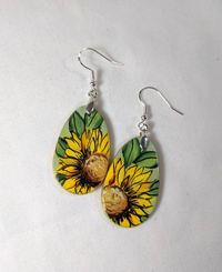 Check out this item in my Etsy shop https://www.etsy.com/listing/784314840/sunflower-earrings-floral-dangles-yellow
