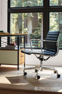 Shop the Eames Aluminum Group Management Chair at 2Modern. Offering a graceful silhouette and distinctly comfortable seat thanks to its innovative suspension system, this desk chair showcases a lightweight aluminum frame outfitted with pneumatic or manual height adjustment and 360-degree swivel for endless mobility. #moderndesign #modernfurniture #modernoffice #modernofficedesign #modernofficechair #officechair