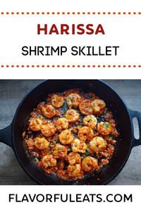 Harissa Shrimp Skillet is a delectable one-pan recipe made with succulent shrimp sauteed with fresh garlic and onion in butter, spicy harissa and fresh herbs! This shrimp is perfect for tacos, over rice, or right out of the pan with a loaf of crusty bread!